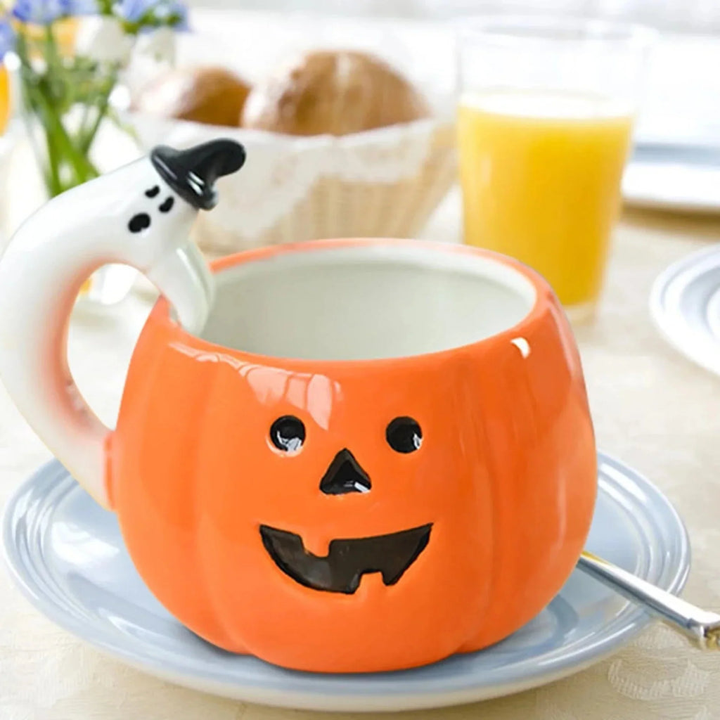 Ceramic Pumpkin Mug with Ghost Handle and Halloween Theme Design